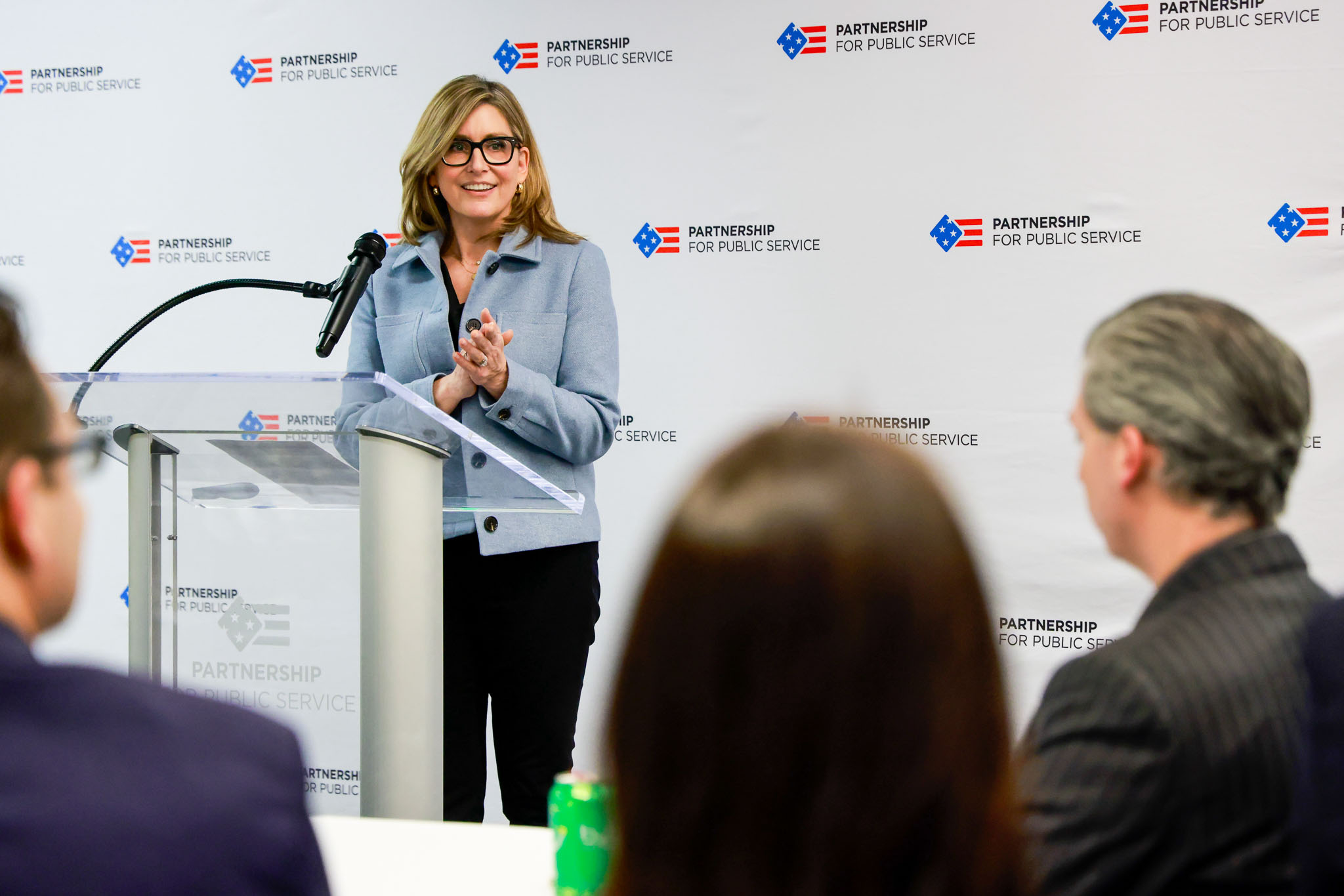 Jennifer Ives at the podium at the AI Center for Government Launch